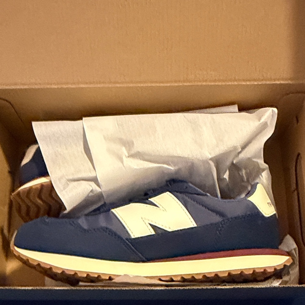 New Balance boys Navy and White Sneakers